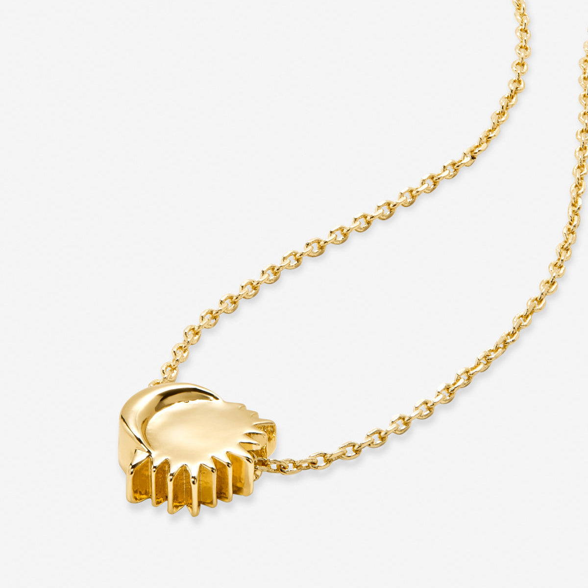 Close-up of a 14k gold-plated celestial necklace featuring a radiant sun and crescent moon pendant on a delicate chain, showcasing its elegant and zodiac-inspired design. Perfect for astrology lovers and as a meaningful gift for women.