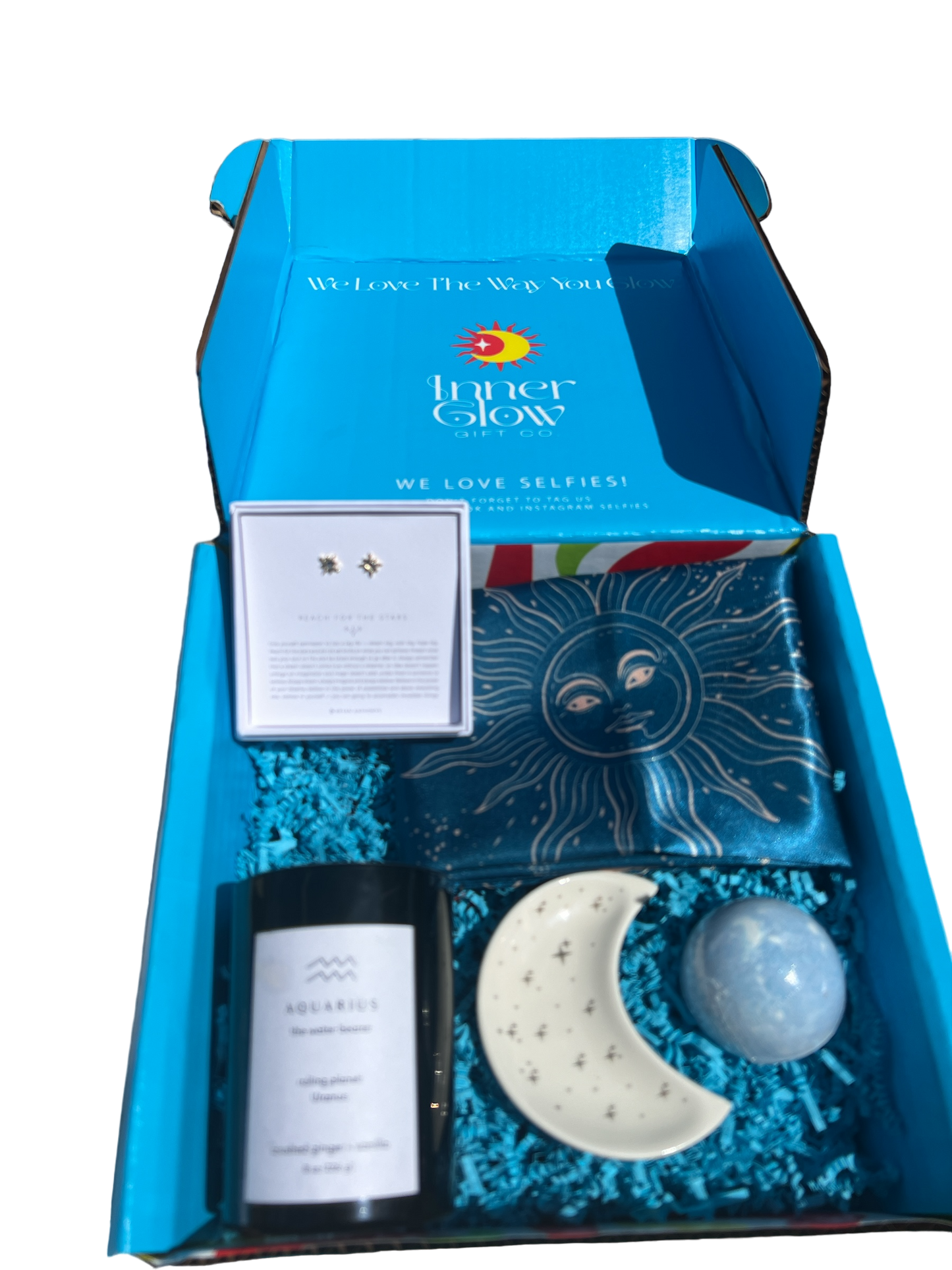 Zodiac Gift Box with gold dainty zodiac celestial stud earrings,  luxury scented candle, navy satin pillowcase,  gua sha tool, and crescent moon trinket dish; celestial-themed self-care gift set for astrology lovers, priced at $35! 