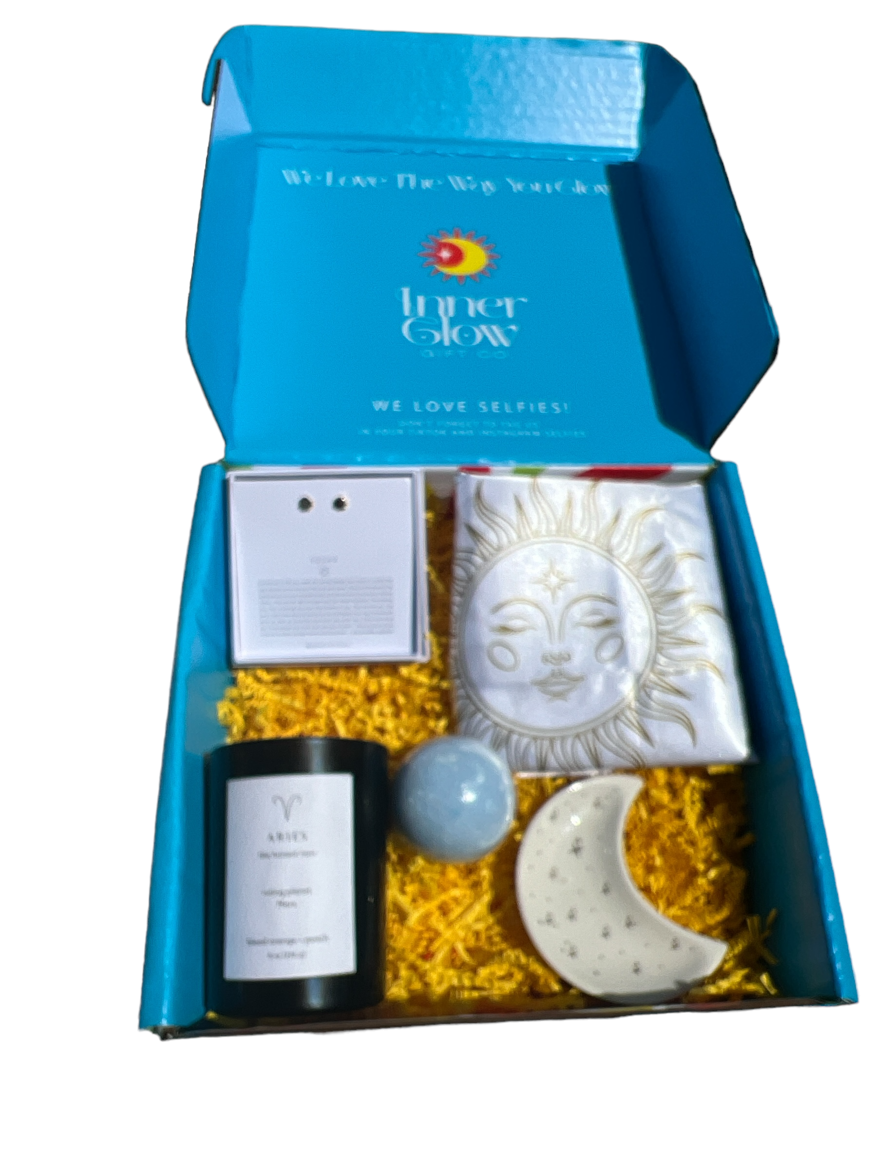 Zodiac Gift Box with gold dainty zodiac celestial inspired, sun stud earrings,  luxury scented candle, white celestial pattern, satin pillowcase,  gua sha tool, and crescent moon trinket dish; celestial-themed self-care gift set for astrology lovers, priced at $35! 