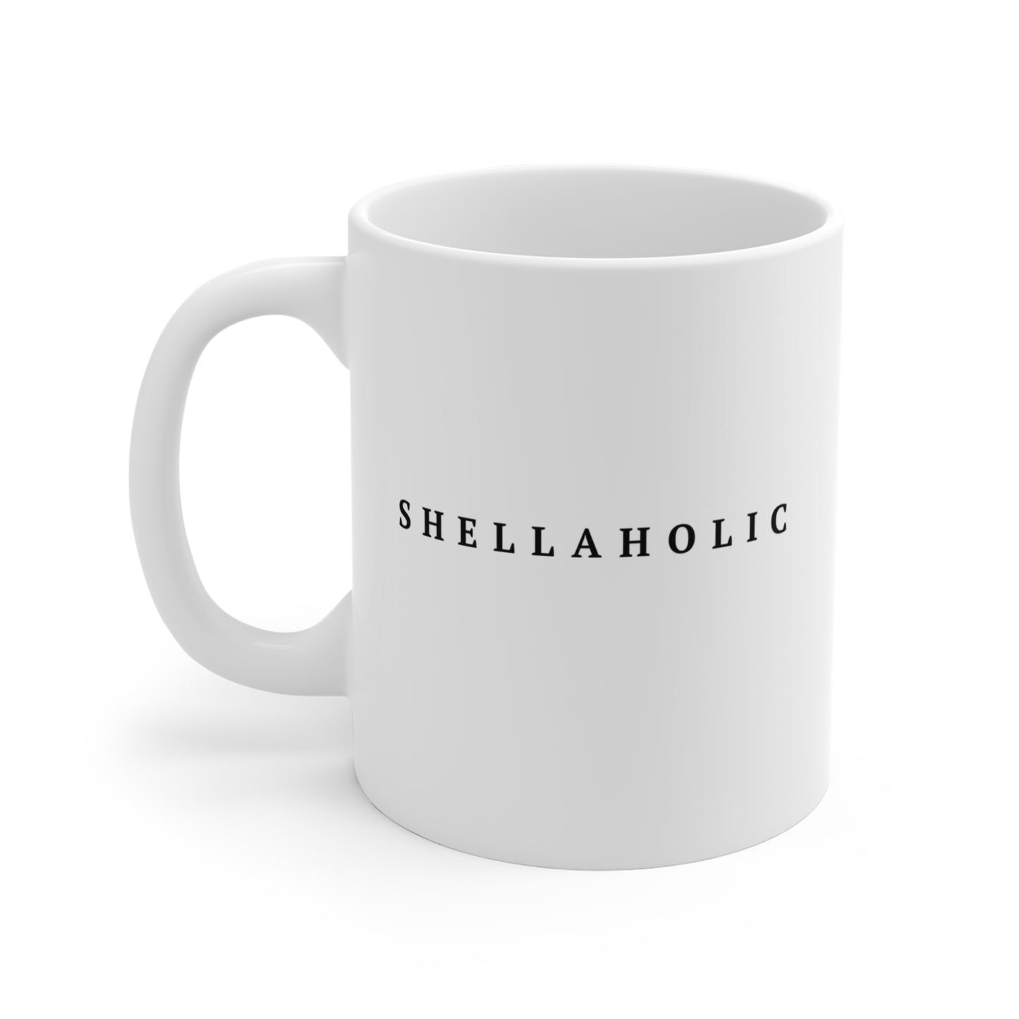 White mug with 'SHELLAHOLIC' text on a white background