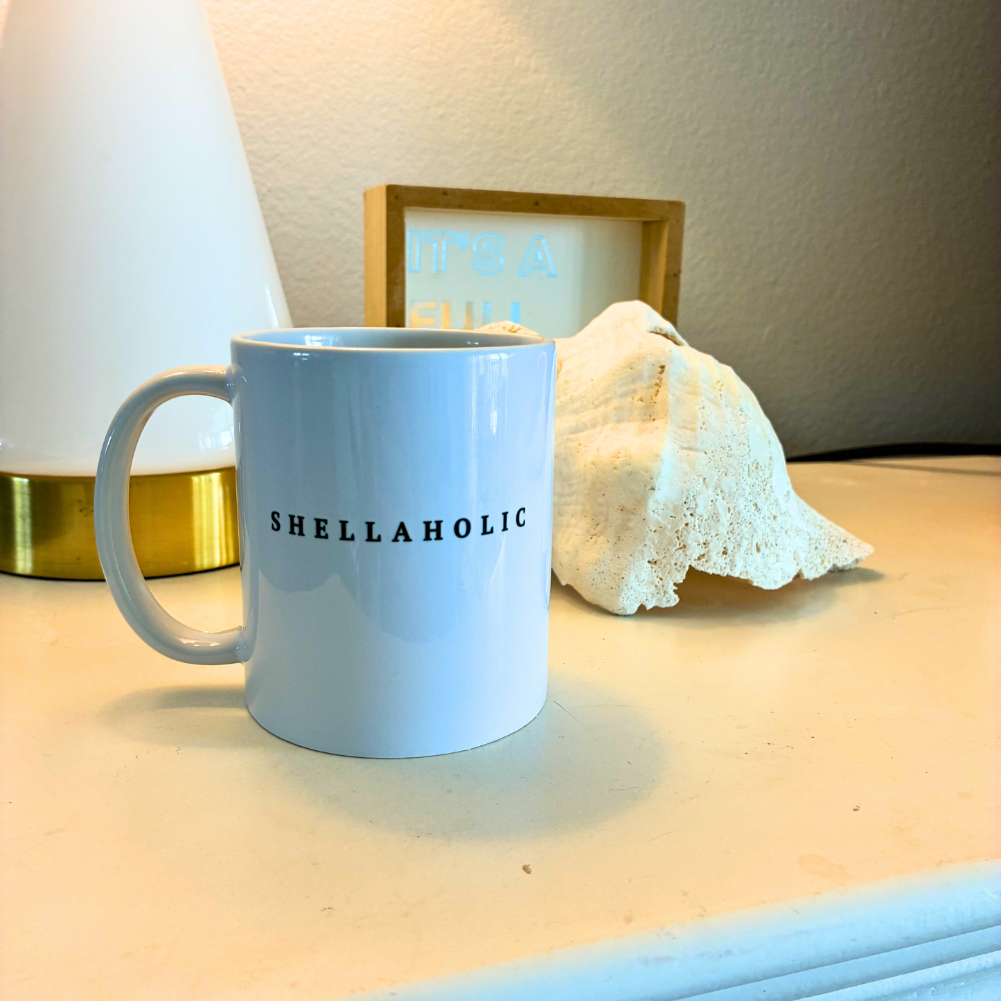 Unique ocean lover gift idea: Shellaholic 11oz tea cup for beachcombers and seashell collectors who love the Florida coast.