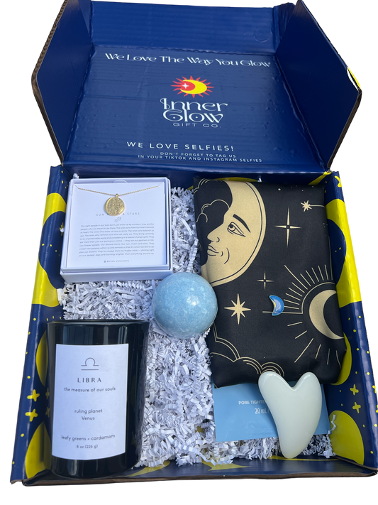 Celestial-themed Zodiac Gift Box featuring a stunning gold zodiac necklace with sun,moon and stars. A luxurious scented candle , satin pillowcase, an invigorating bath bomb, a gua sha for glowing skin, and a pore-tightening mask! Perfect for astrology lovers and self-care enthusiasts. Priced at $45, this premium gift set combines beauty, wellness, and celestial vibes for an unforgettable gifting experience. Ideal for birthday gifts, zodiac fans, and thoughtful presents!