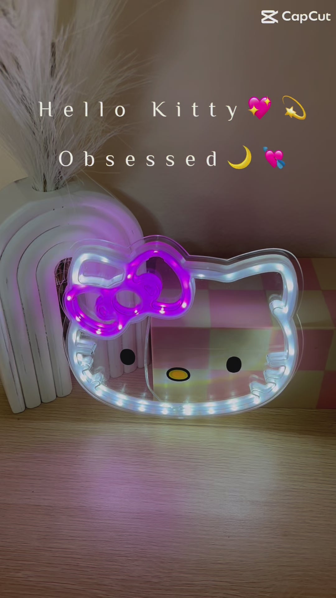 Close-up of Hello Kitty LED decorative light showing detailed facial features and glowing pink bow accent. This kawaii wall lamp creates a soft, comforting glow perfect for bedtime routines, reading nooks, or anime-themed room decor. Energy-efficient LEDs ensure cool-touch operation safe for children's rooms. The perfect blend of cute character design and functional lighting for Sanrio fans